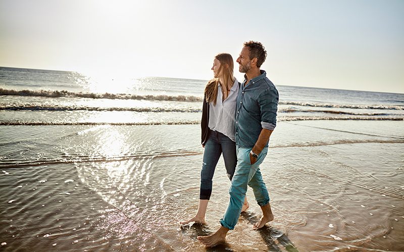 Couple walking on the beach